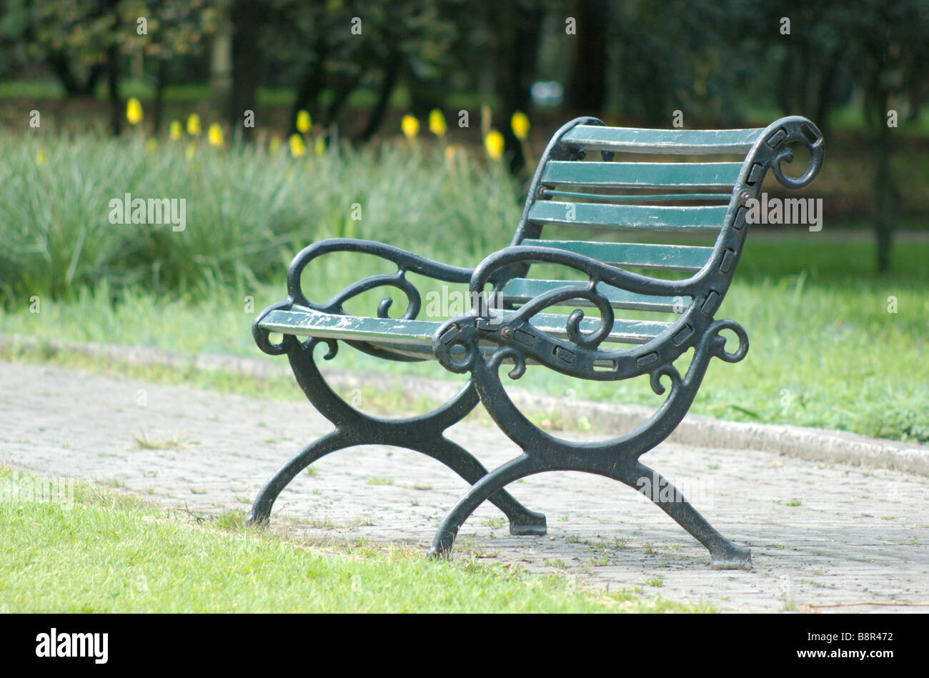 A wooden bench at the Bogota Botanical Garden, Bogota, Colombia Stock Photo