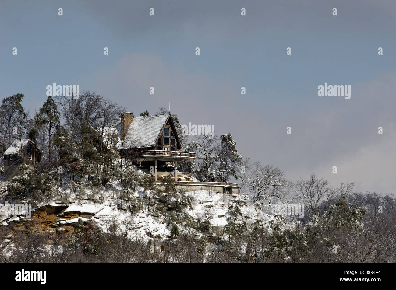 Home on Exposed Ridge Covered with New Snow in Clark County Indiana Stock Photo