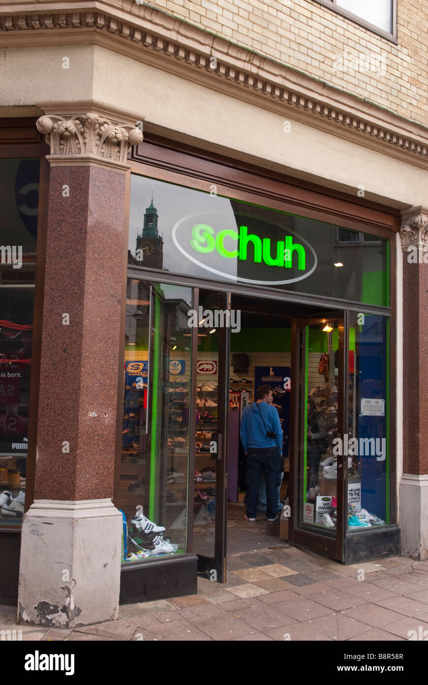 Schuh shoe shop store selling shoes and footwear in the city centre of Norwich,Norfolk,Uk Stock Photo