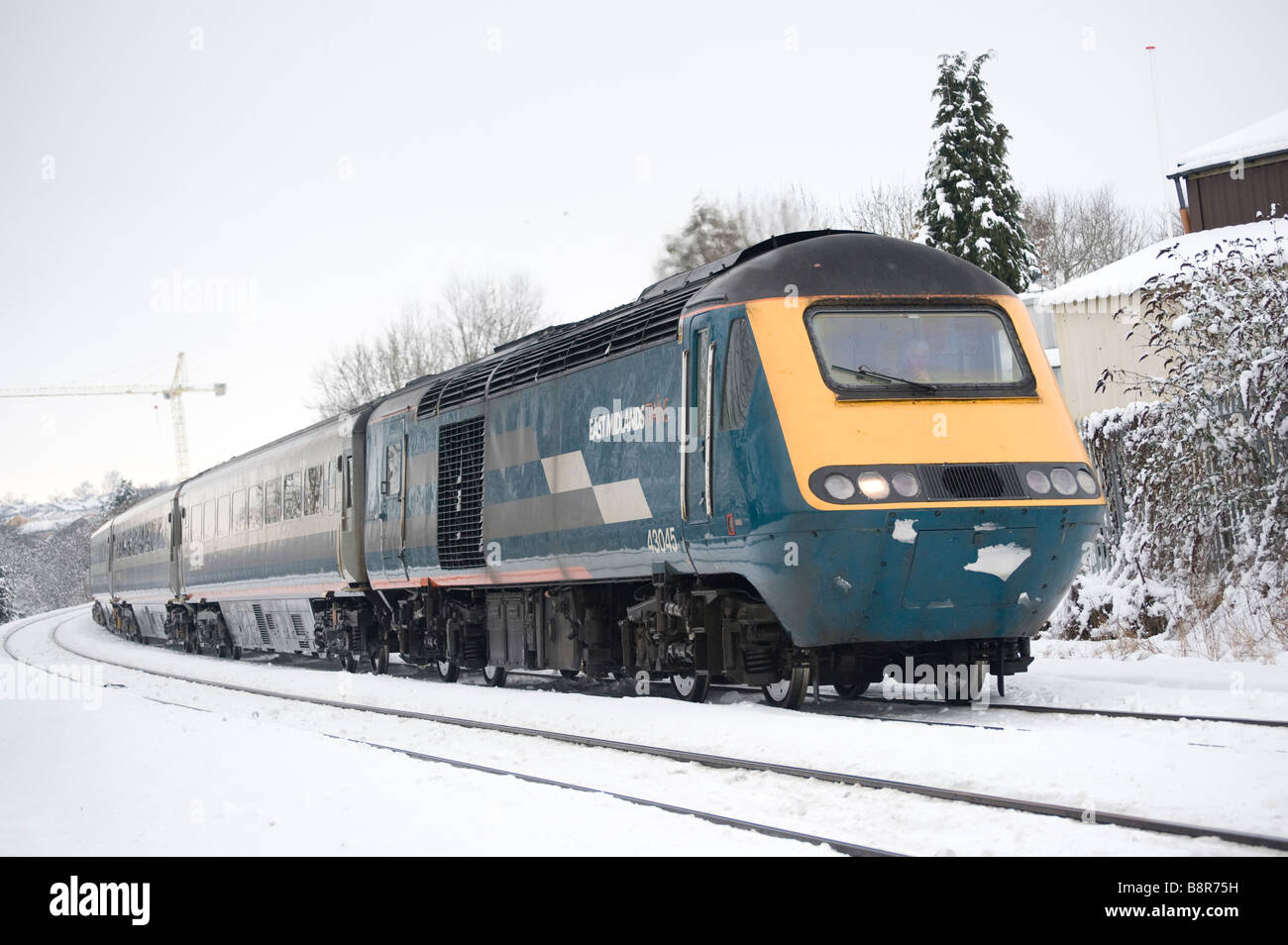 Class 43 125 hst high speed train in East Midlands Trains livery travelling through snow in the Leicestershire countryside. Stock Photo