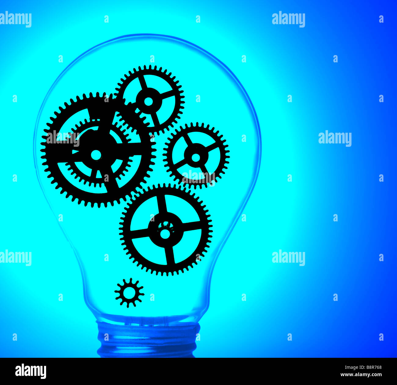 gears in a light bulb Stock Photo Alamy