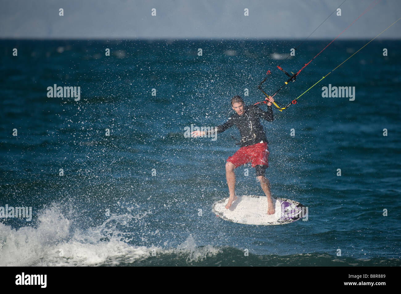 kitesurfer on skimboard Stock Photo Alamy