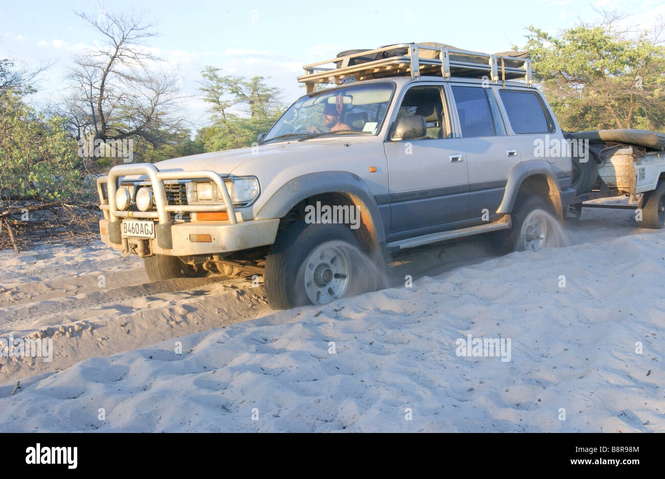 4x4 in soft sand Stock Photo Alamy