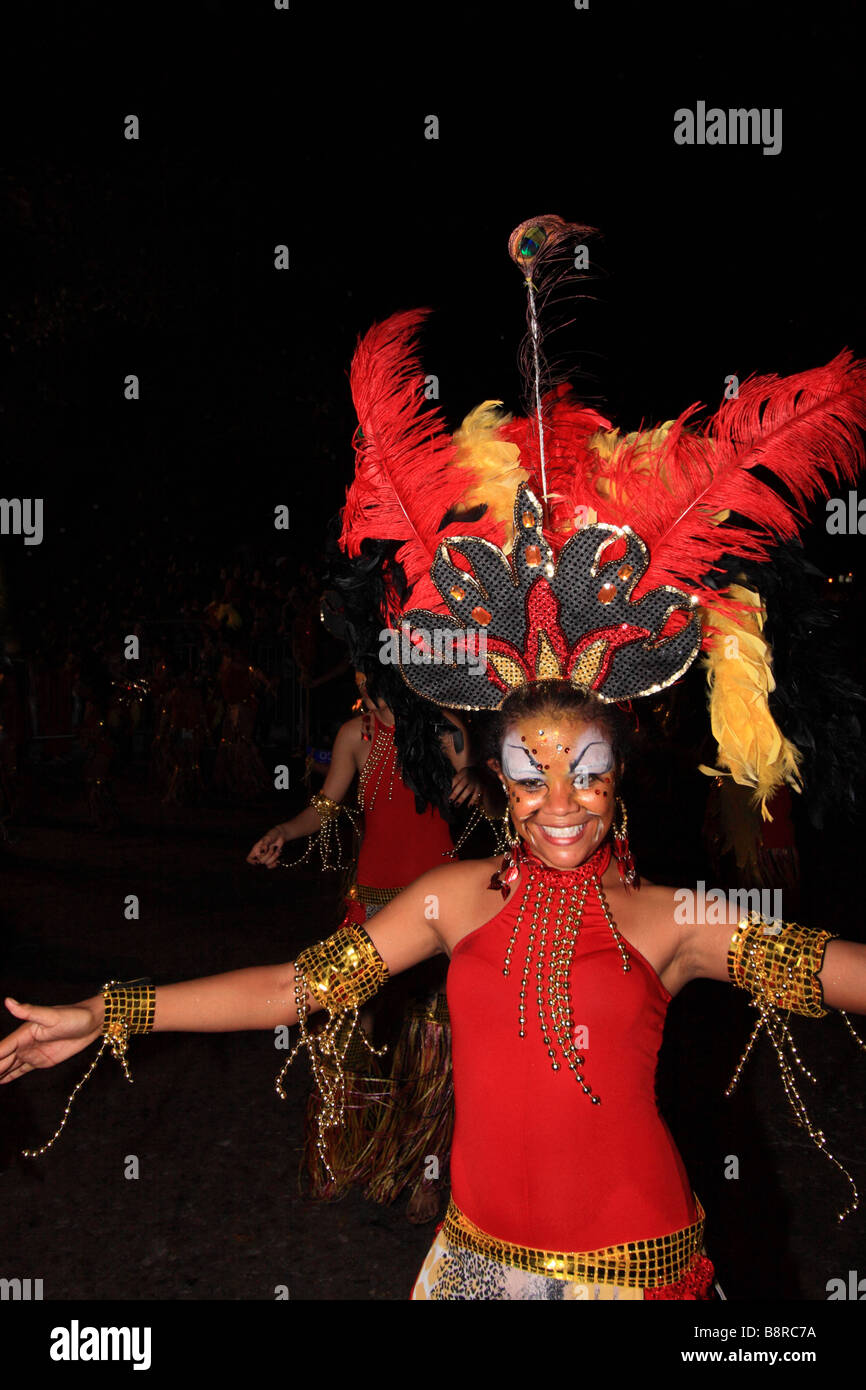 Young beatiful woman masked in the street during the Carnival of Barranquilla, Atlantico,  Colombia, South America Stock Photo