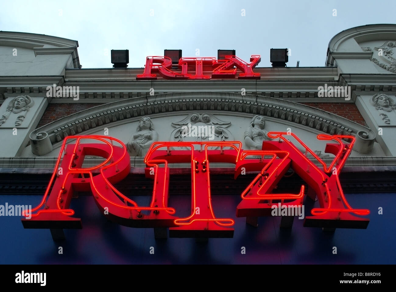 Ritzy neon light sign at entrance to The Electric Pavilion, The Pullman Cinema commonly known as Ritzy cinema in Brixton, London Stock Photo