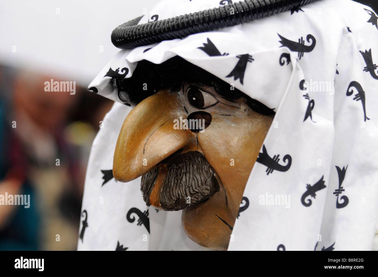 Caricature of an Arab sheik during a parade of masked people during the Carnival in Basel, Switzerland. Stock Photo