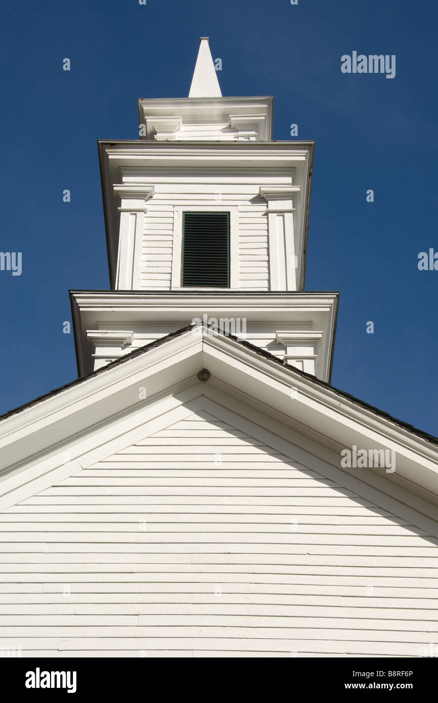 White clapboard church in New England with a steeple Stock Photo