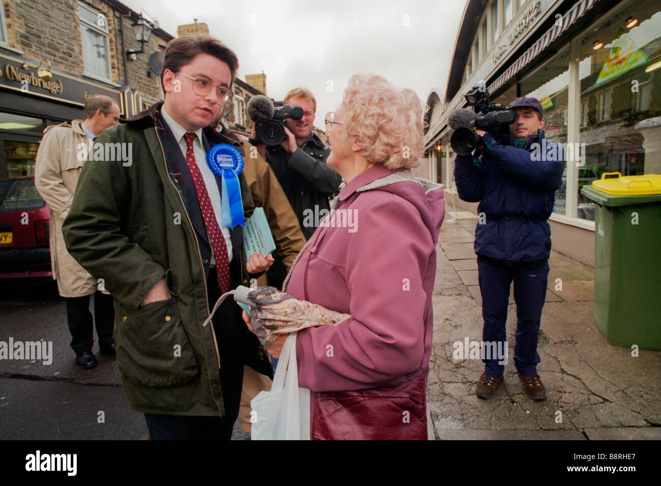 Tory Party candidate campaigning and being filmed by TV news cameramen during Islwyn byelection South Wales UK Stock Photo