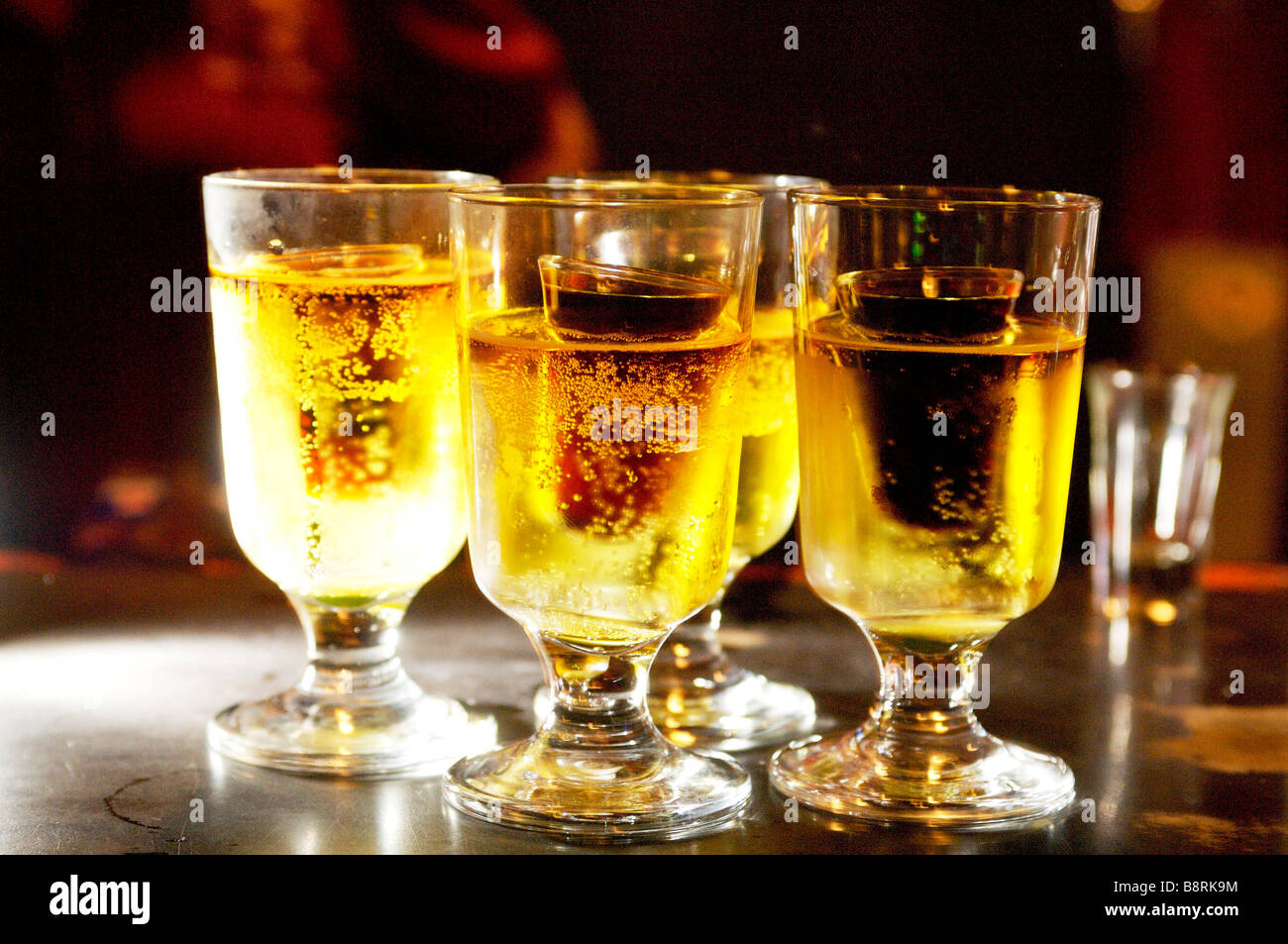 Cocktails on a dark bar top at night. Drinking in a bar or Stock Photo Alamy