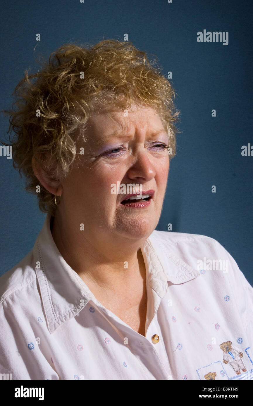 Disgusted facial expression Stock Photo