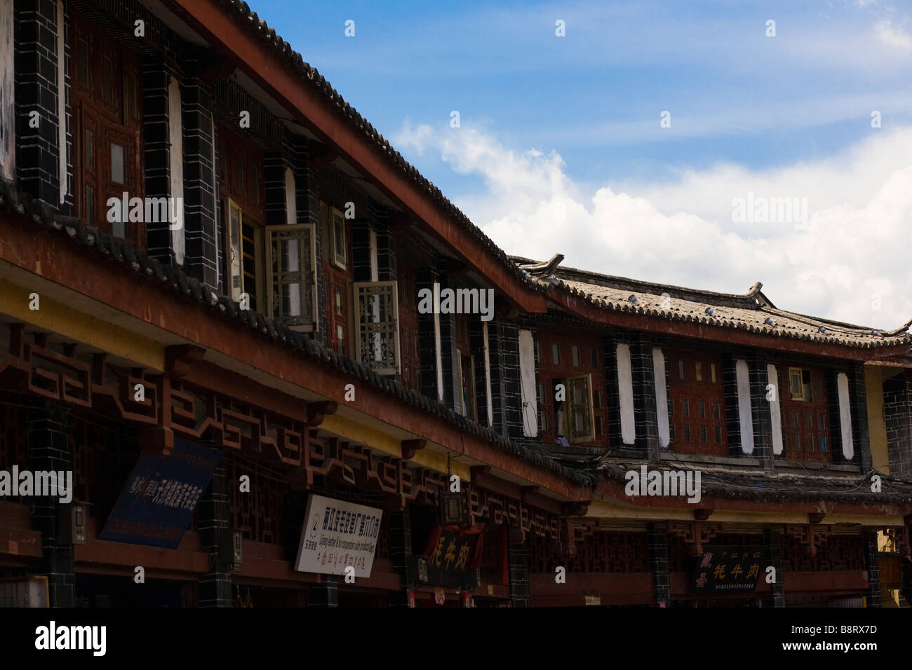 Traditional Naxi Wood Houses In The Old Town Of Lijiang - 