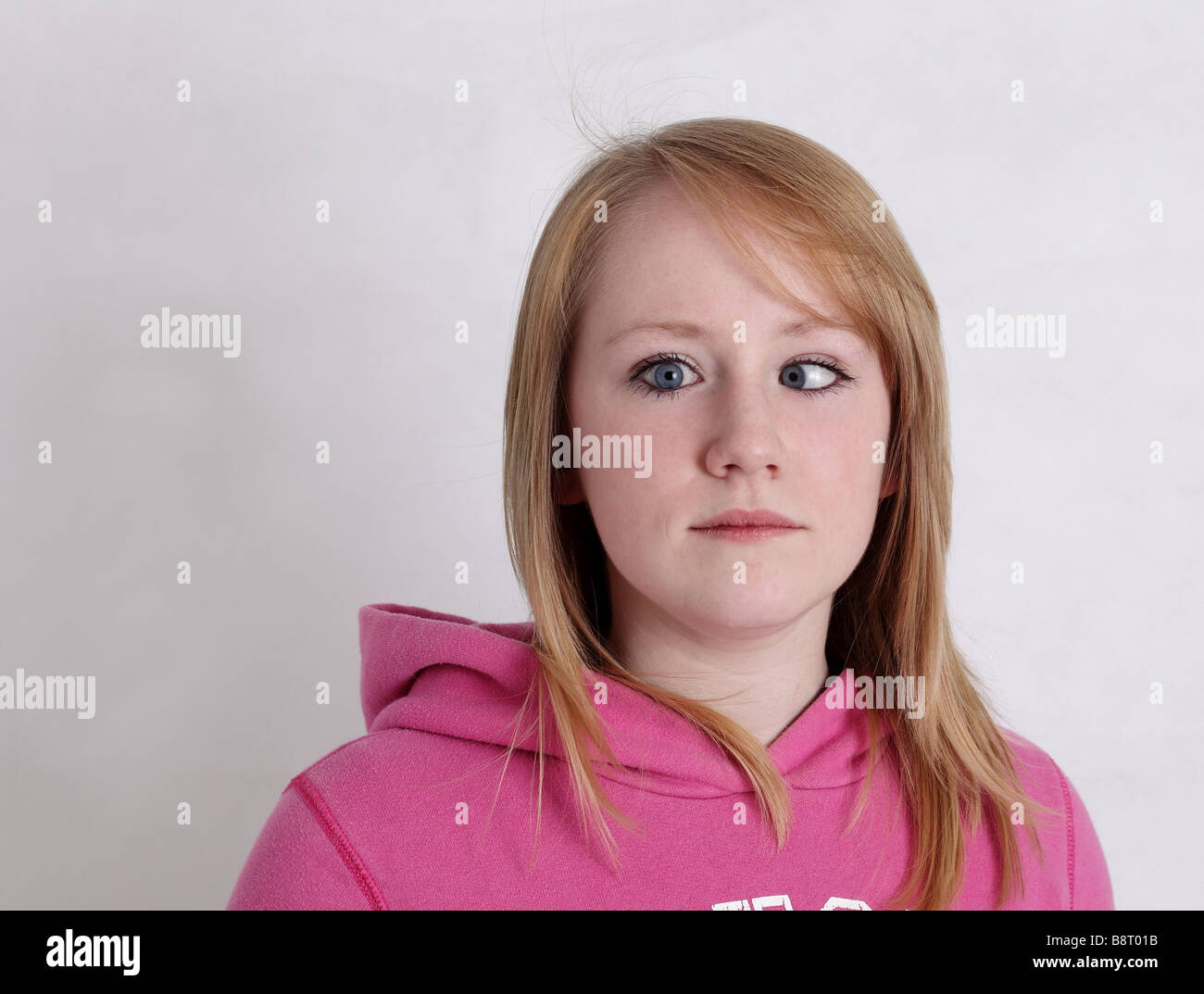 Cross eyed teenage girl - Youth social issues series Stock Photo