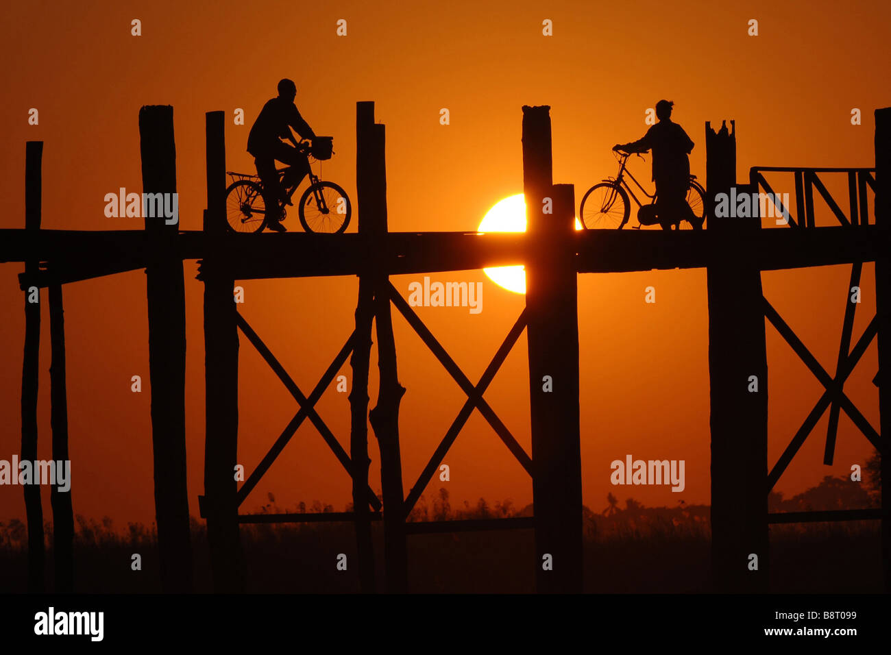 Wooden bridge two men hi-res stock photography and images - Alamy