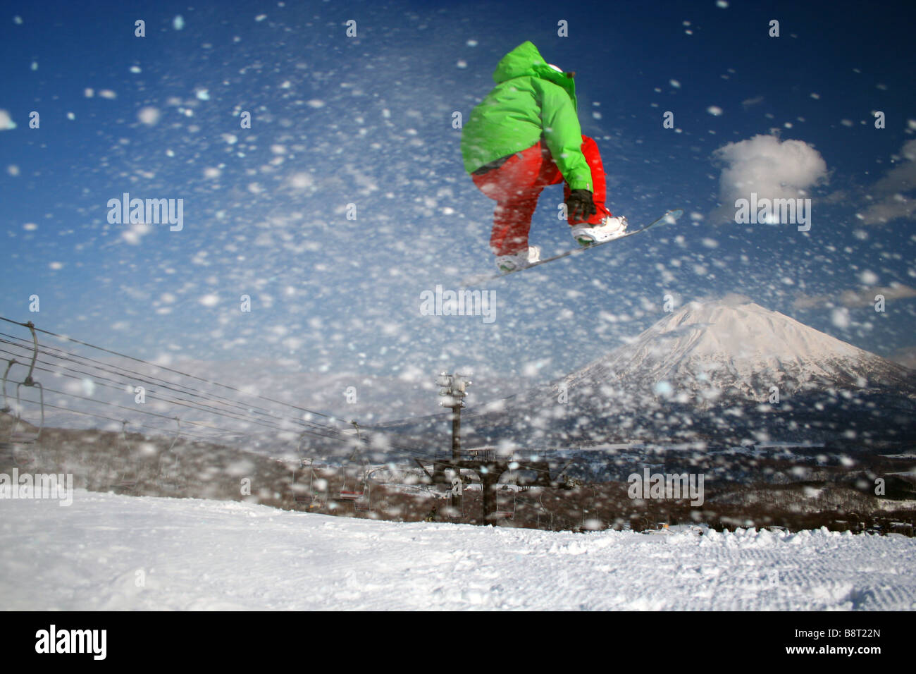 Snowboard frontside 180 by Mount Yotei, Niseko, Japan Stock Photo Alamy