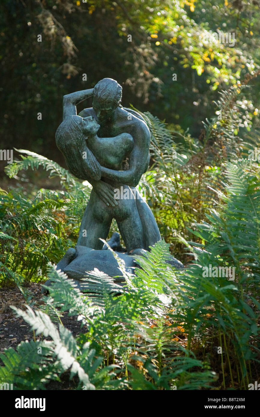 A Statue of a man and woman embracing at the Umlauf Sculpture Garden in Austin Texas Stock Photo