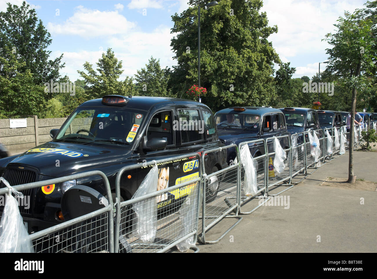 Black Taxi Cabs queuing outside Wimbledon Tennis waiting for passengers Stock Photo