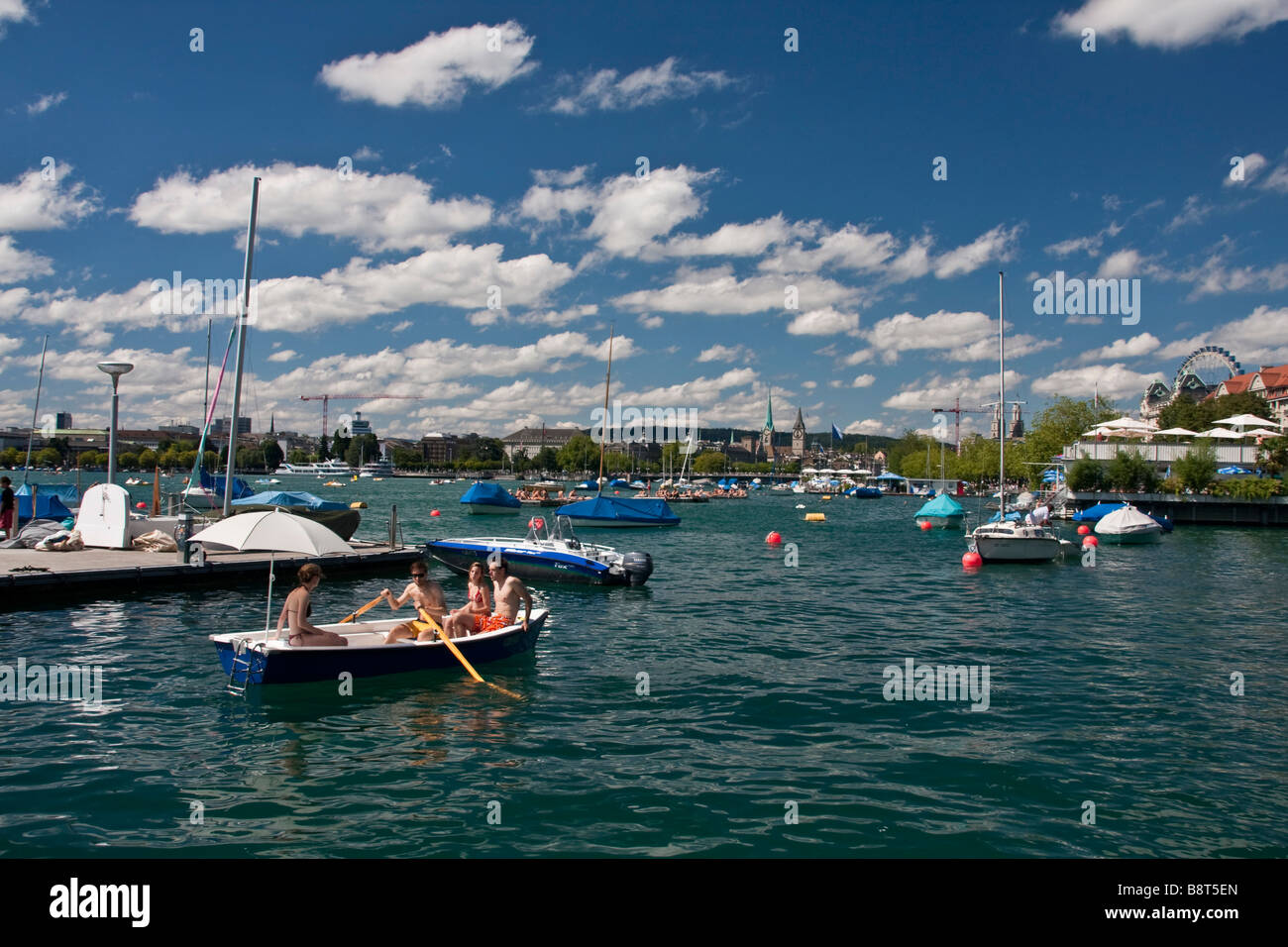 rowboat at Zurich lake in summer Zuerich Switzerland Stock Photo