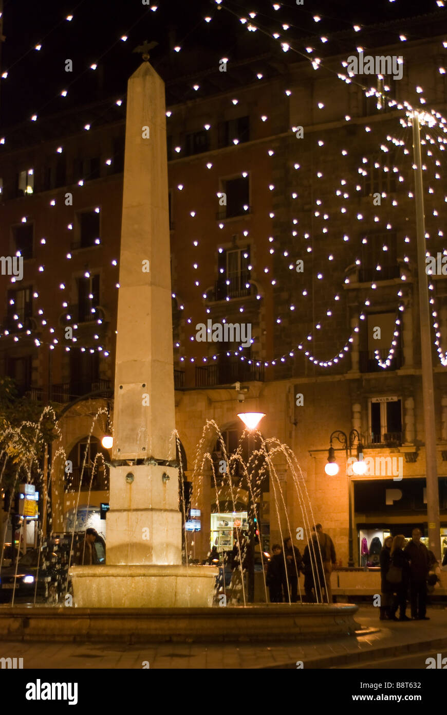 Christmas lights are strung across the main square of Paseo de Bom in Palma, Mallorca Stock Photo