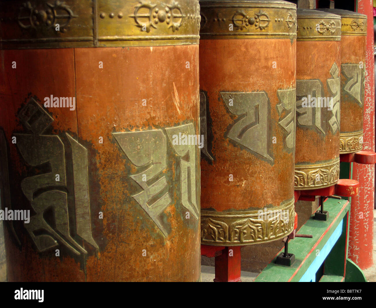 Prayer wheels at Bhuddist temple, Chengde, China Stock Photo