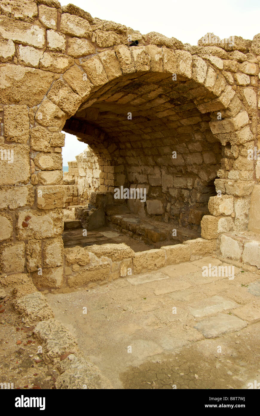 Covered stone arched passageway chamber room in King Herod built port Caesarea Stock Photo