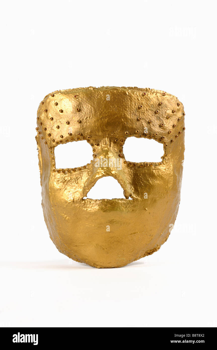 A homemade gold coloured mask Stock Photo