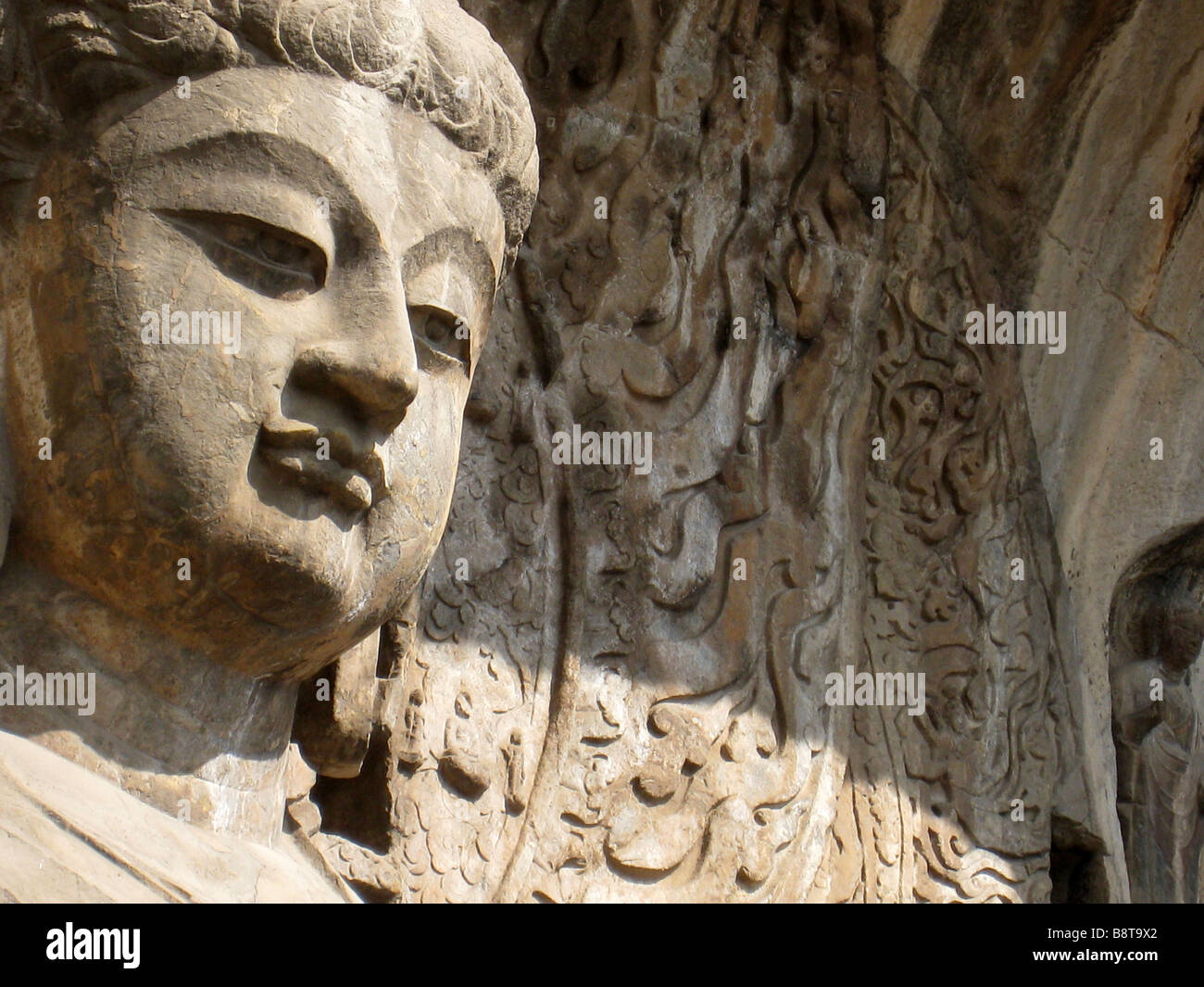 Bhuddist carvings at Longmen Caves, Luoyang, China Stock Photo - Alamy