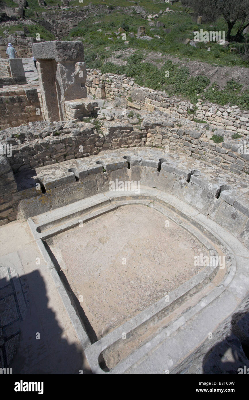 Latrines at the Cyclops Baths. Roman City of Dougga, The Tell, Tunisia. Dougga, The Tell, Tunisia. Stock Photo