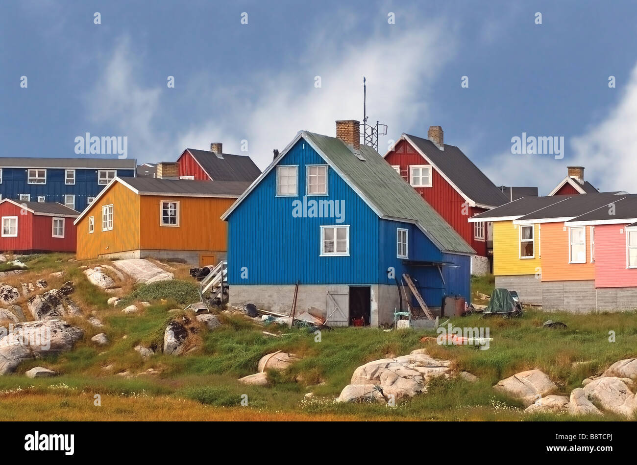 traditional brightly colored houses in a Greenland fishing village in