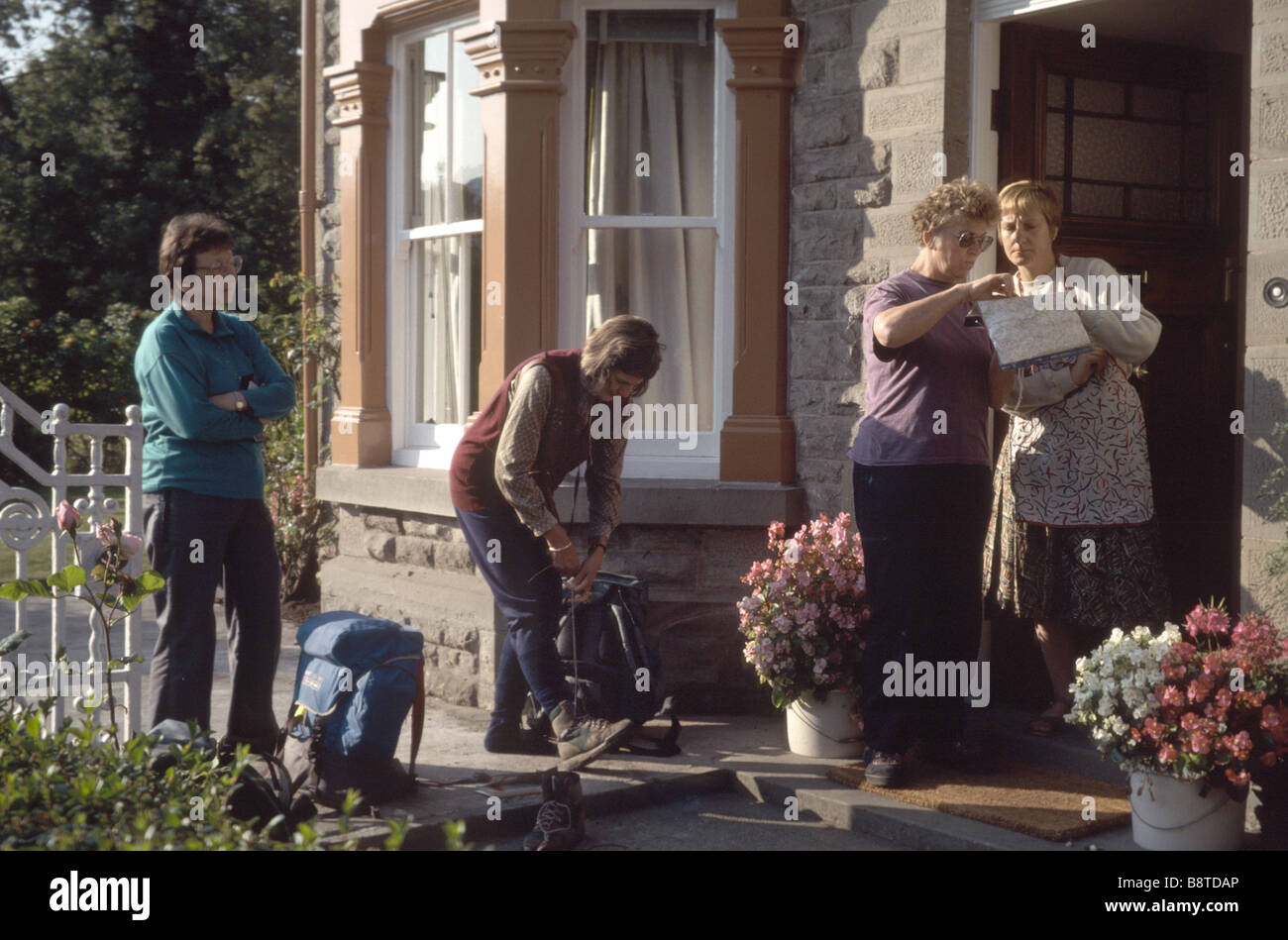 Walkers getting ready to go on the trail after staying in "Bed and
