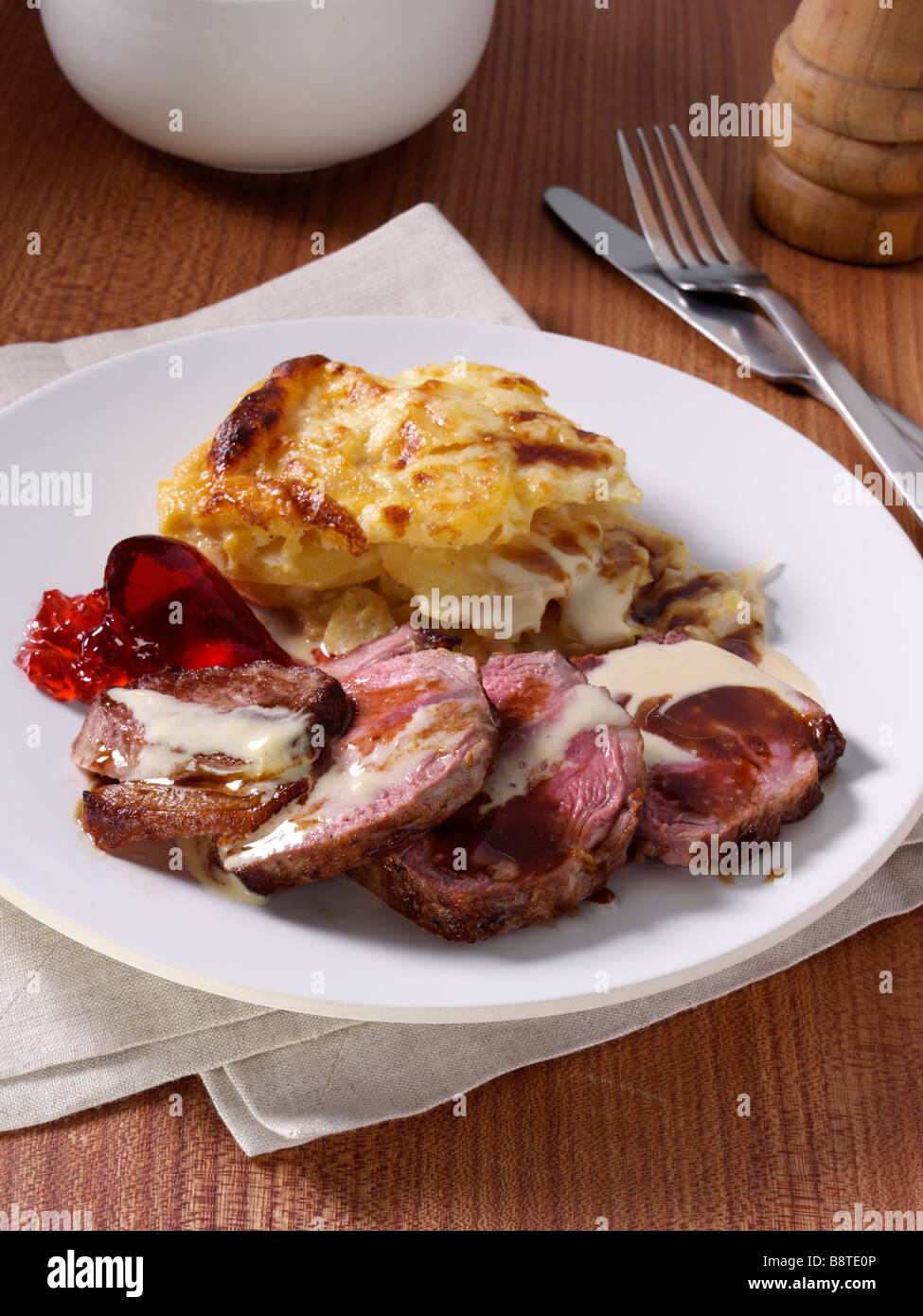 Lamb rump with dauphinoise potatoes Stock Photo Alamy