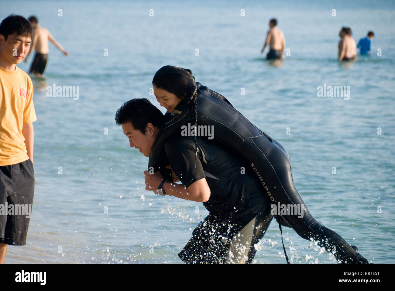 Scuba divers training for Rescue Diver qualification on White Beach