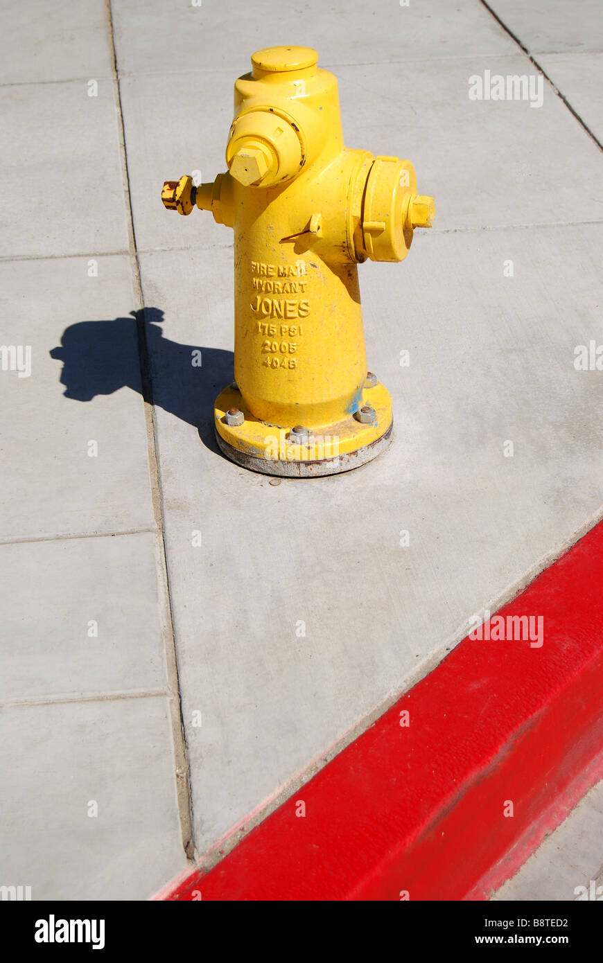 Fire hydrant on sidewalk, Los Angeles, California, United States of America Stock Photo