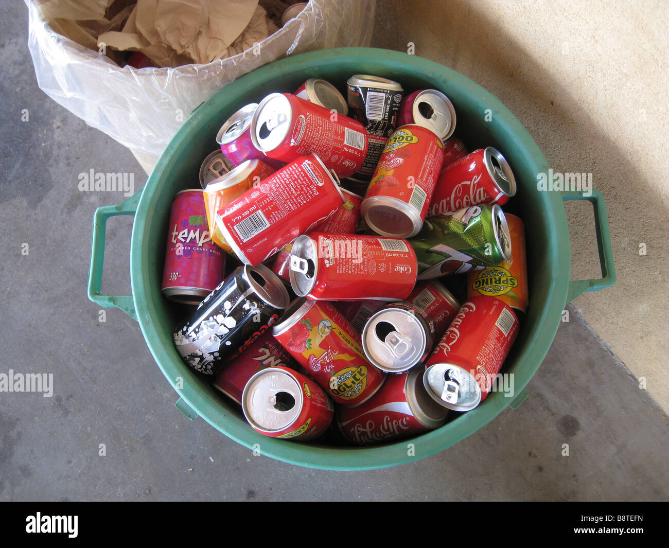 Download Empty Coca Cola cans in a trash bin Stock Photo: 22665881 ...
