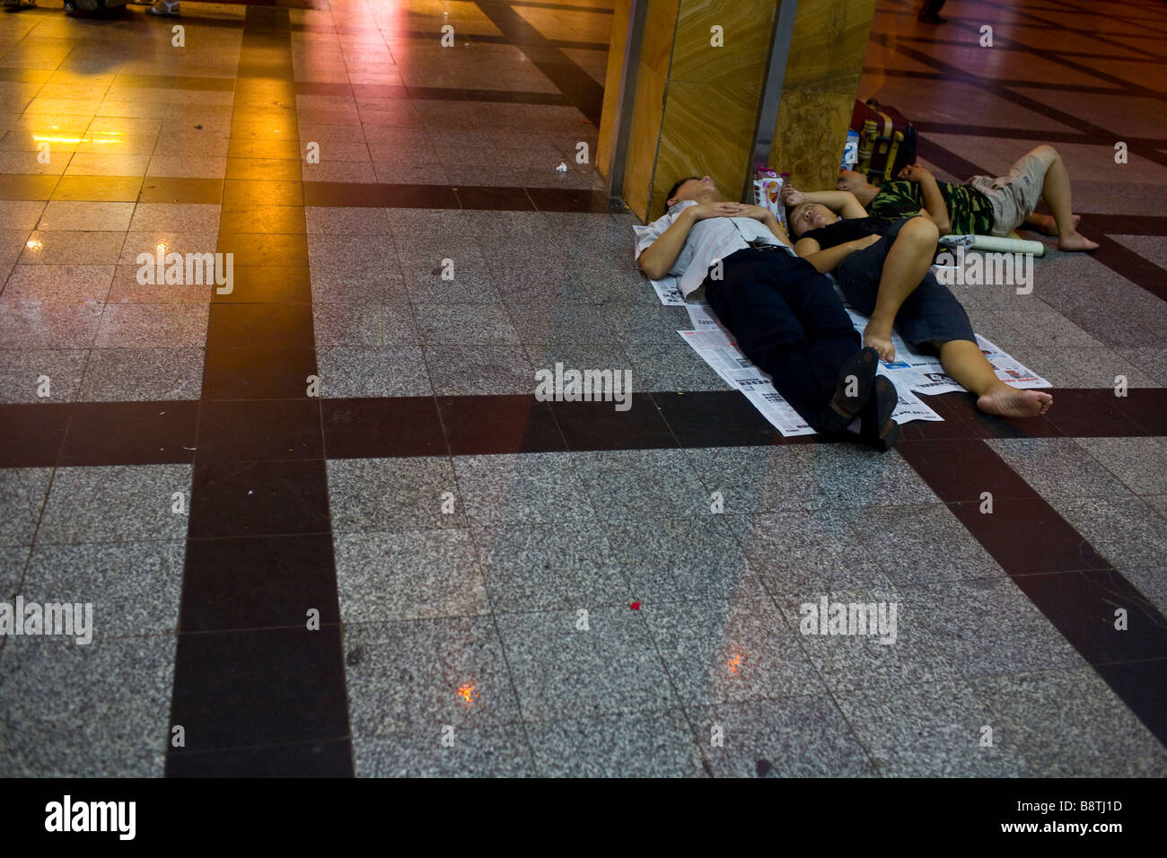 People sleeping on train hi-res stock photography and images - Alamy