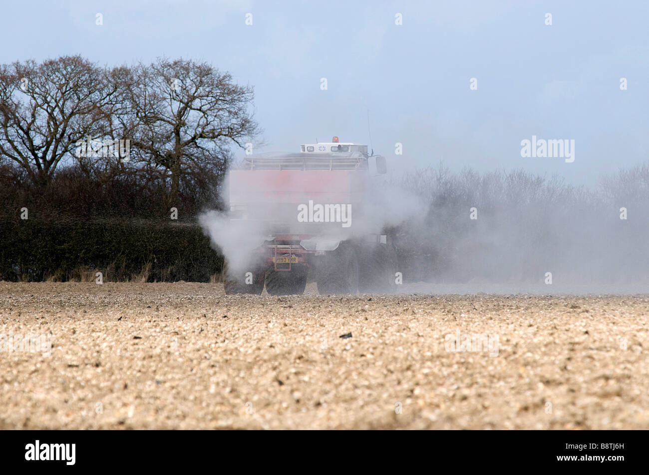 Spreading Lime on a field Stock Photo Alamy