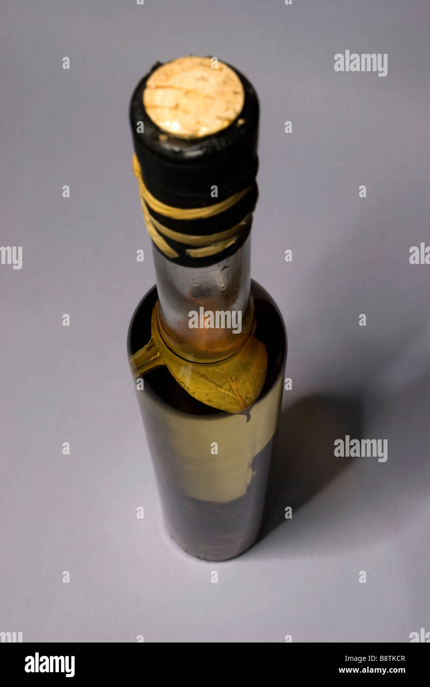 Bottle of olive oil infused with herbs and spices 1 Stock Photo - Alamy