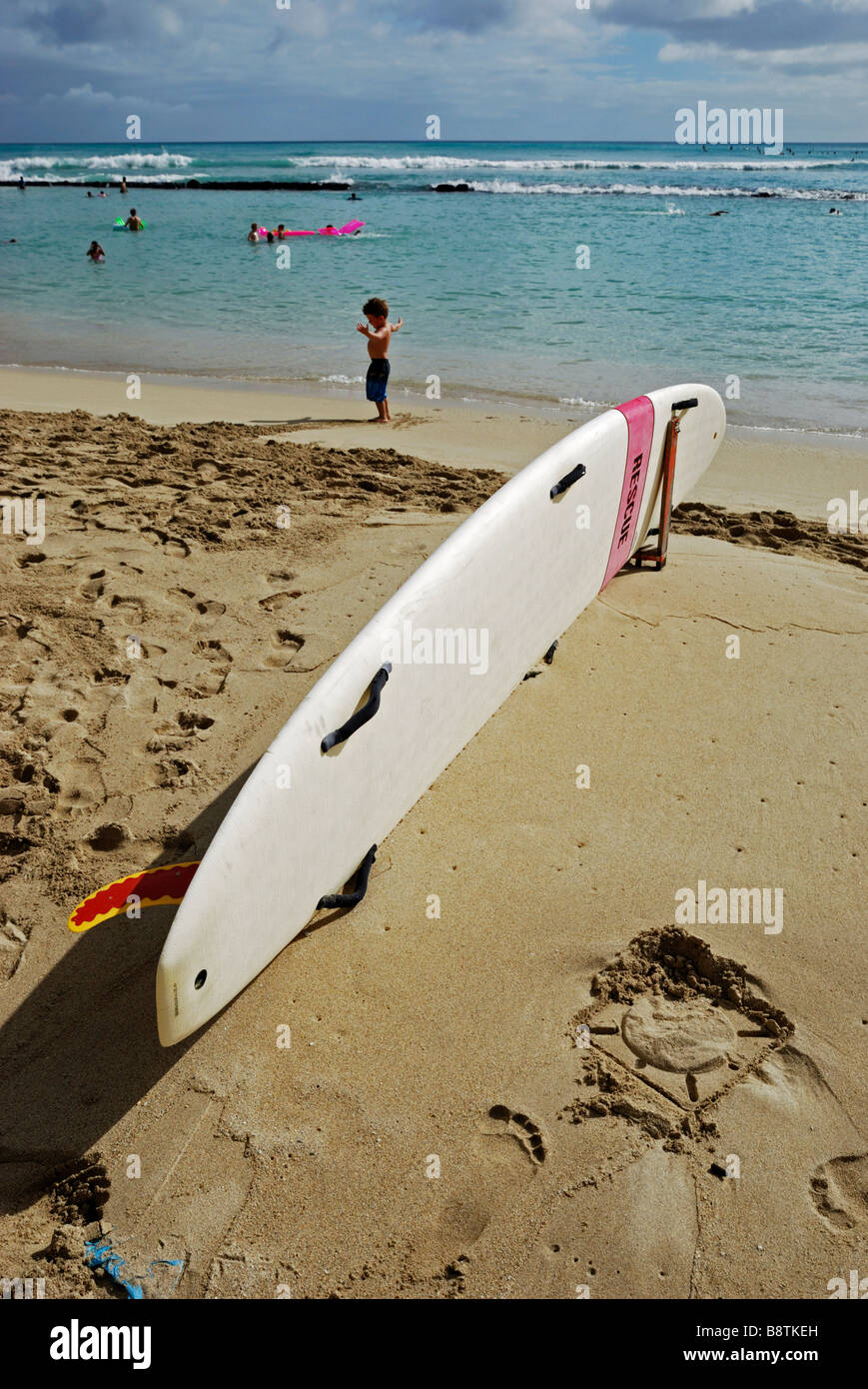 A rescue surfboard on Waikiki Beach, Honolulu, Oahu, Hawaii Stock Photo