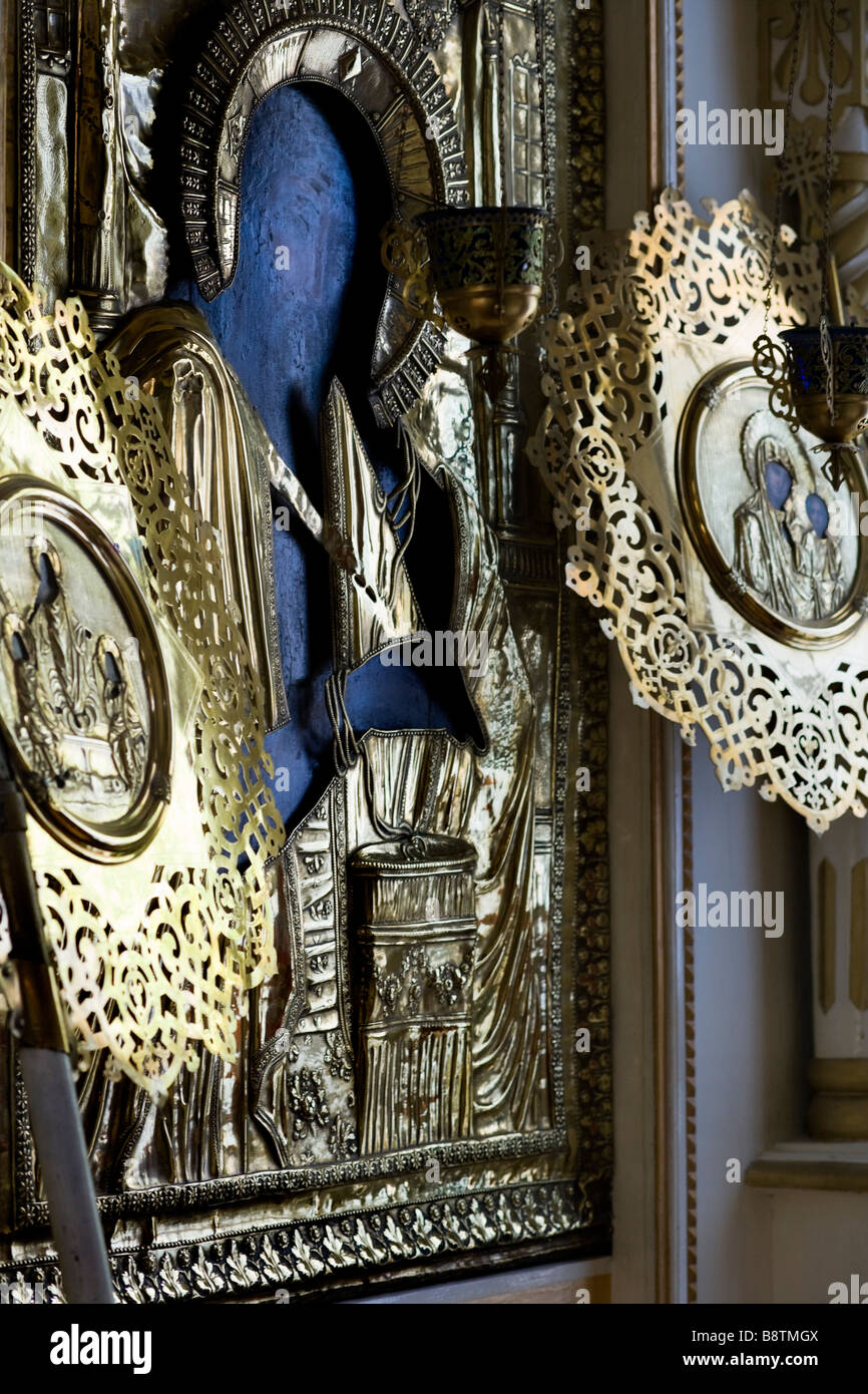 Old Russian Ikons of the Holy Family with golden ornaments inside Saint Kazan church, Almaty, Kazakhstan. Stock Photo