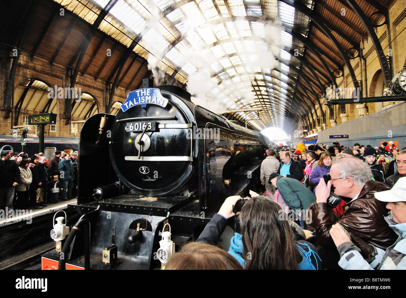 Steam train at Paddington Station, London, by train