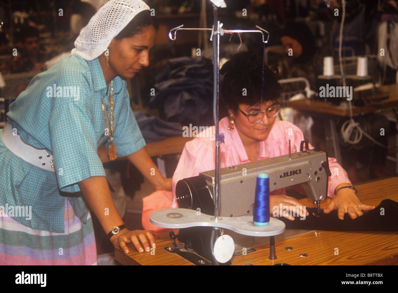 Machinist in a clothes factory in Egypt Stock Photo Alamy