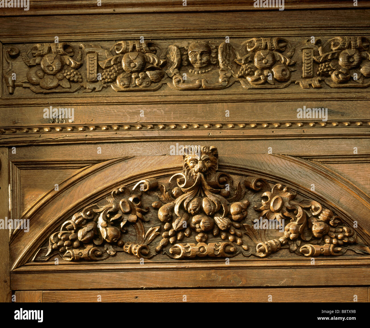 Barrington Court Detail of carved wooden frieze above the door in the