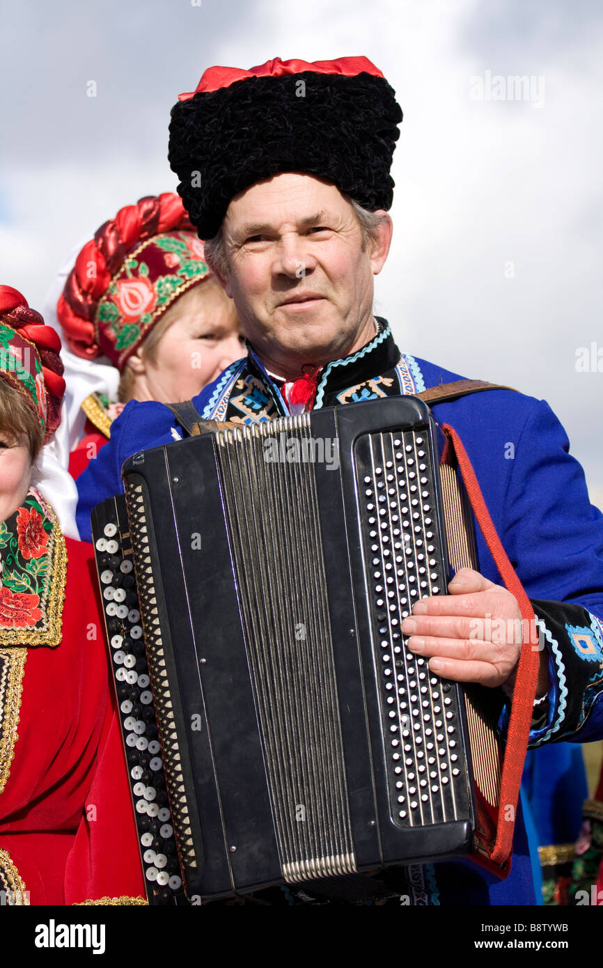 men playing on the accordion Stock Photo Alamy
