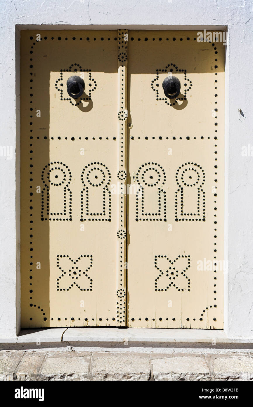 Traditional Tunisian doors. Place Farhat Hached, Sousse, Tunisia.  . Dougga, The Tell, Tunisia. Stock Photo