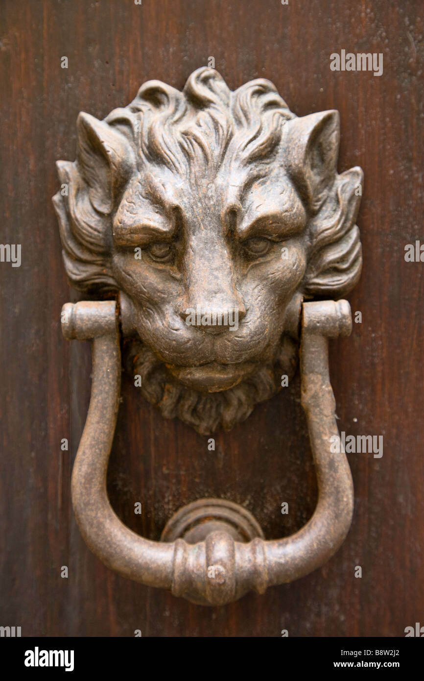 Decorative door knocker in Volterra, Tuscany, Italy Stock Photo - Alamy