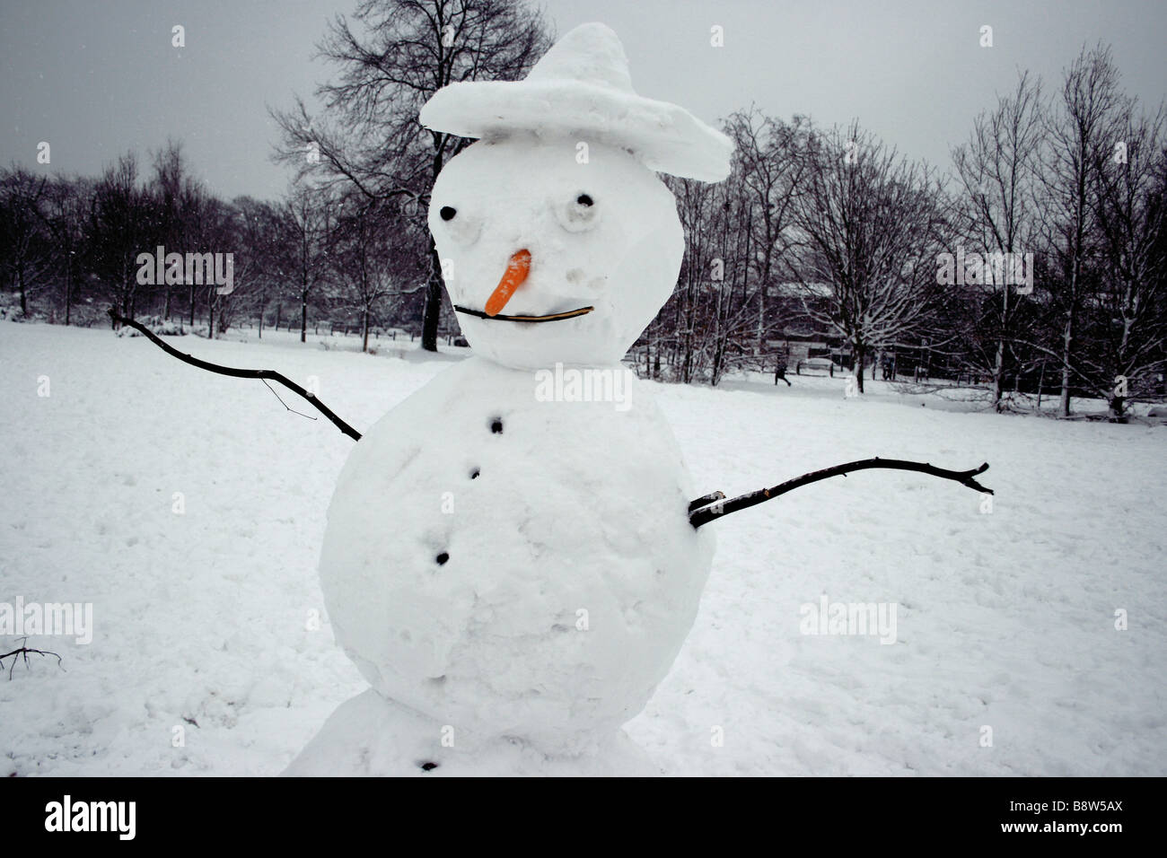funny snowman in hat Stock Photo