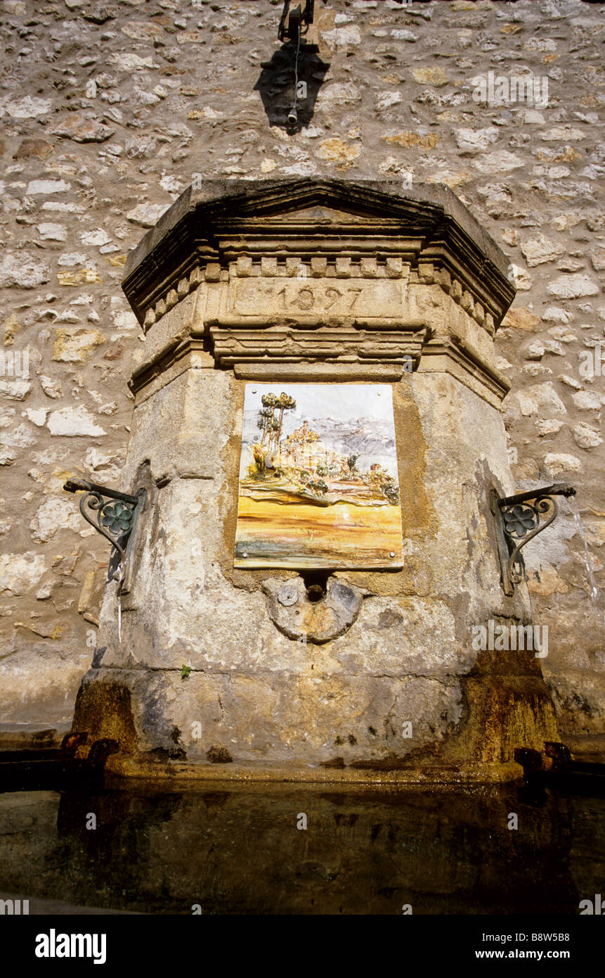 Old fountain in the coastal village of La Roquette sur Var near Nice Stock Photo