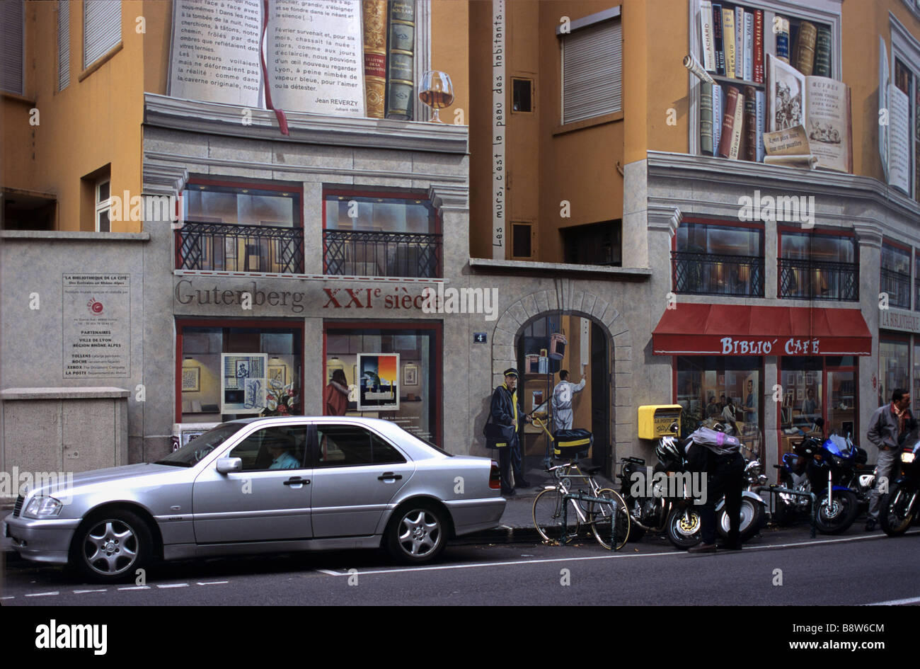 Mural or Wall Paintings of Books & Bookcases on Facade, Lyons or Lyon, France Stock