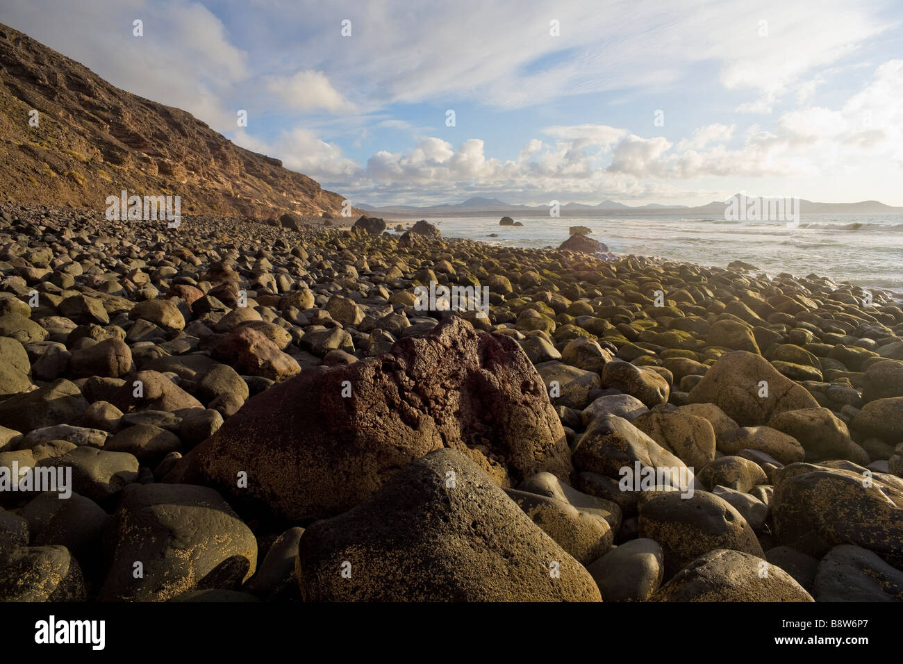 Rocky shoreline north of Famara,west coast of Lanzarote, Canary Islands, Spain. Stock Photo