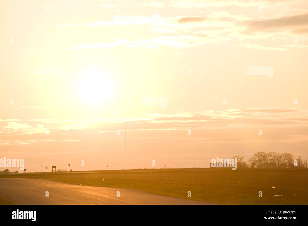 Cloudy sky with golden sunset hi-res stock photography and images - Alamy