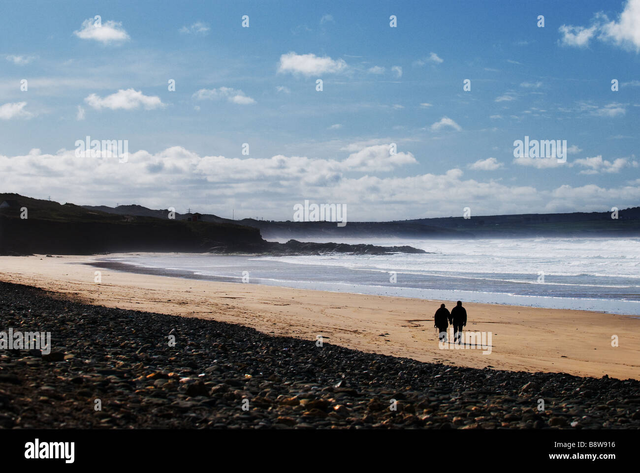 People walking on Gwithian Towans beach in Cornwall Stock Photo Alamy